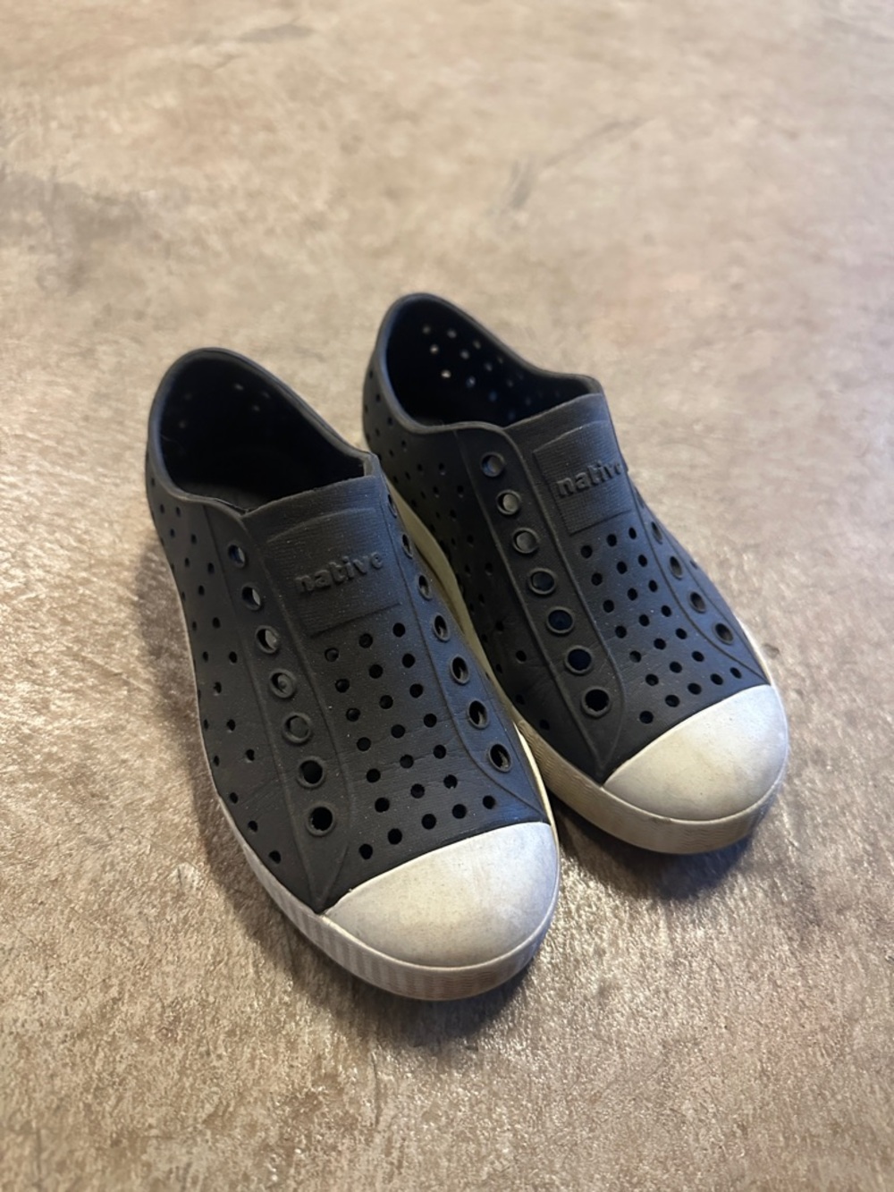 Native Jefferson Slip-On shoes in Black with White Toe Cap